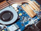 Close-up of a computer fan and circuitry