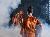 Two martial artists in traditional attire face off in a dramatic, smoke-filled arena.