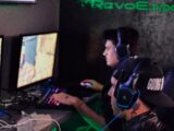 two men playing PC games