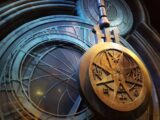 gold-colored clock wall decor
