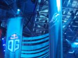 Blue banners with team logos at an esports event