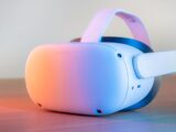 pink and white vr goggles