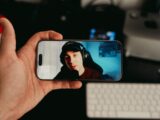 Person watching a live stream on their phone.