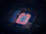 An ice rink is illuminated at night in a city
