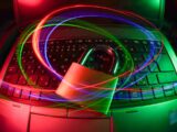 padlock on laptop with light trails