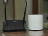 a couple of routers sitting on top of a table